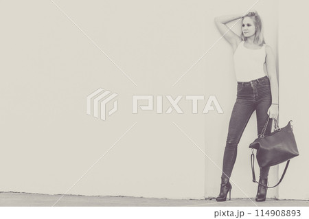 Trendy urban girl outdoors Trendy urban girl outdoors 114908893