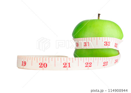 green apple with measure tape green apple with measure tape 114908944