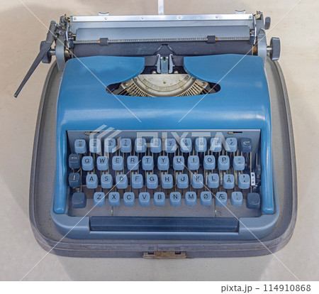 Blue Portable Typewriter Machine 114910868