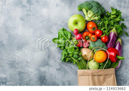 paper bag with fresh fruits and vegetables on light color background, 114913662
