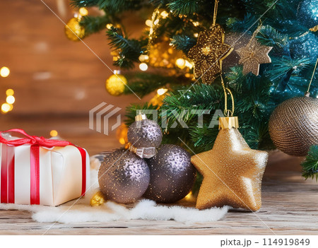 Merry Christmas ornaments. Minimal Small Red and Gold Christmas balls. and gift boxes on a wooden table Merry Christmas ornaments. Minimal Small Red and Gold Christmas balls. and gift boxes on a wooden table 114919849