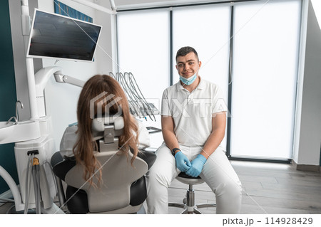 The dental clinic provides a full range of services, including treatment, implant placement, and professional care. A modern medical center provides high quality treatment and helps to restore the 114928429