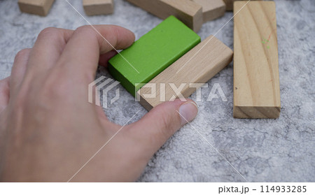 Children wooden blocks parts for game.Board game concept .Entertaining games for children.Kindergarden education games.close up view 114933285