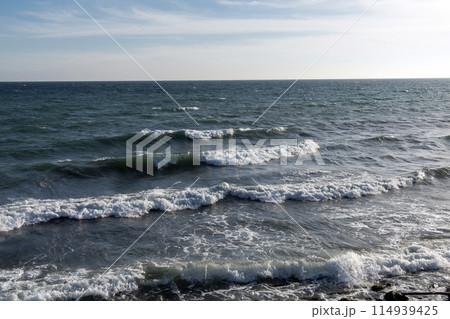 View of a stormy seascape of waves and the Black Sea View of a stormy seascape of waves and the Black Sea 114939425