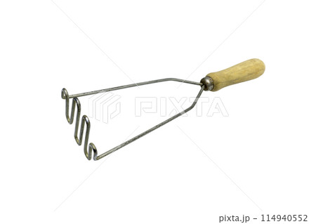 Press for a potato isolated on a white background Press for a potato isolated on a white background 114940552