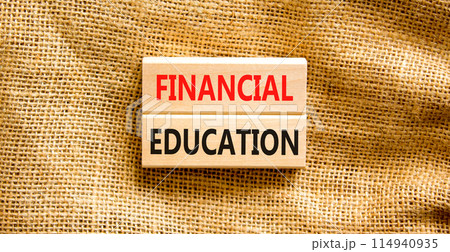 Financial education symbol. Concept words Financial education on beautiful wooden block. Beautiful canvas background. Business Financial education concept. Copy space. 114940935