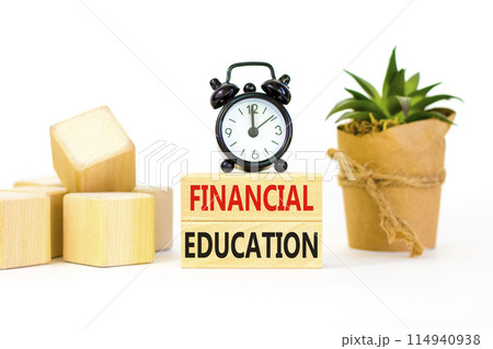 Financial education symbol. Concept words Financial education on beautiful wooden block. Beautiful white paper background. Black alarm clock. Business Financial education concept. Copy space. 114940938