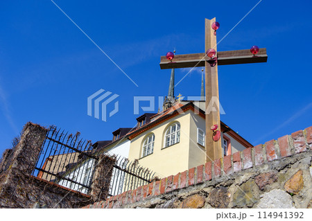 The Cathedral of St. Peter and Paul behind a cross in Brno, Czech Republic The Cathedral of St. Peter and Paul behind a cross in Brno, Czech Republic 114941392
