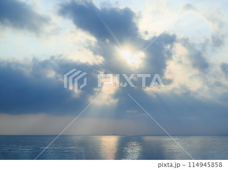 The sun, sea, horizon and clouds at dawn on the Arabian Peninsula in the United Arab Emirates The sun, sea, horizon and clouds at dawn on the Arabian Peninsula in the United Arab Emirates 114945858