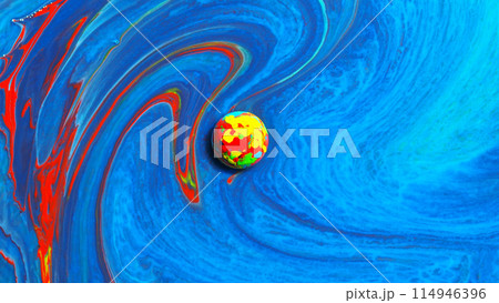 Top view of macro abstract of the drop of multicolor acrylic on milk background Top view of macro abstract of the drop of multicolor acrylic on milk background 114946396