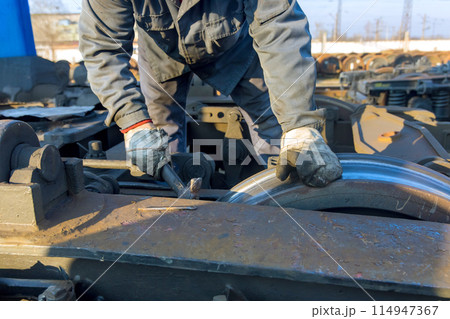 Railway car wheelsets were located on railway junction while waiting for repairs 114947367
