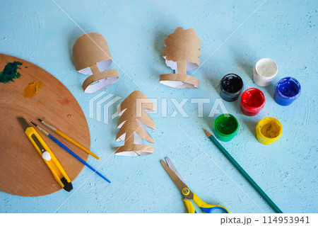 Kids craft trees out of recycling toilet paper roll, zero waste concept. Step by step tutorial - 3. 114953941