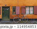 Charming European Street Scene with Vintage Bicycle 114954853