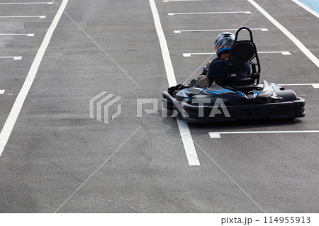 Go kart racing track, Kart racers drive on the open track, Go Kart Race Track. 114955913