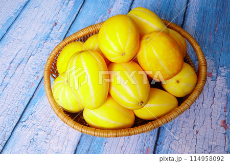 Korean melons on the wooden background Korean melons on the wooden background 114958092