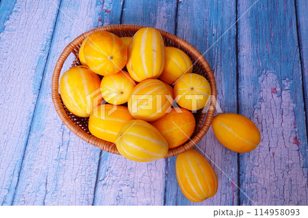 Korean melons on the wooden backgroun 114958093