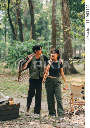 Asian couple sweet in tent inside on they camping trip, traveller relax and sleep togather in out door and camping trip Asian couple sweet in tent inside on they camping trip, traveller relax and sleep togather in out door and camping trip 114963192