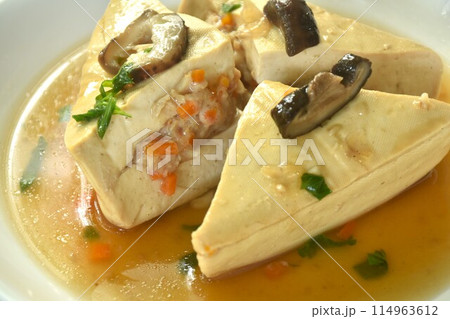 steamed white tofu stuffed mashed pork in gravy sauce on plate steamed white tofu stuffed mashed pork in gravy sauce on plate 114963612