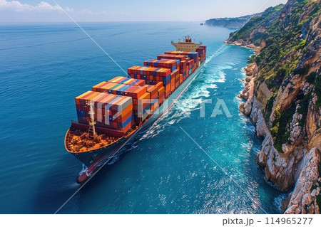 Marine grandiosity: a container ship with cargo fits perfectly into the bright blue picture of the ocean under a clear blue sky 114965277