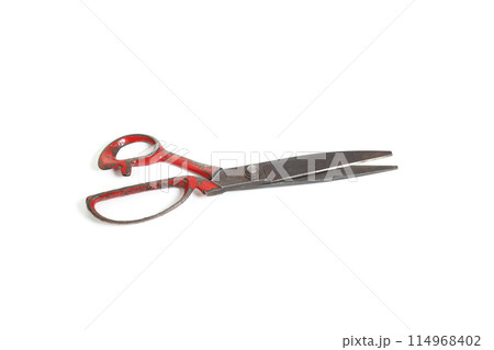 Old rusty red scissor on white isolated background 114968402