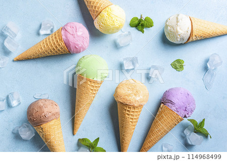 Various ice cream scoops in cones Various ice cream scoops in cones 114968499