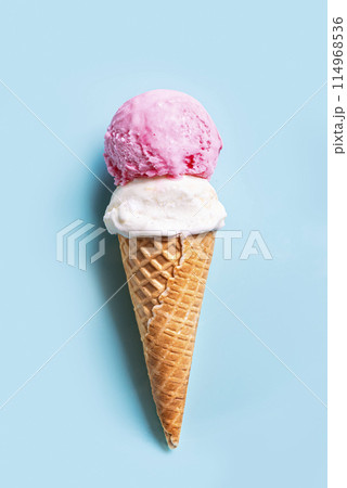 Ice Cream Scoops in Cone on blue background 114968536