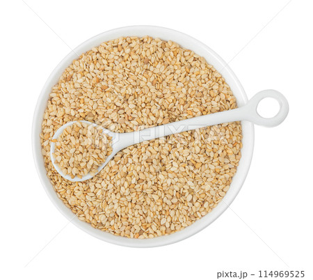 Sesame seeds in ceramic bowl isolated on white background. Top view. Flat lay Sesame seeds in ceramic bowl isolated on white background. Top view. Flat lay 114969525