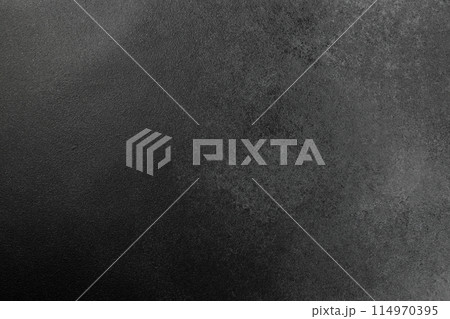 Gray and black texture on concrete. Black background 114970395