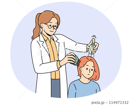 Girl with lice in hair at doctors appointment using spray and comb to treat and fight nits 114971332
