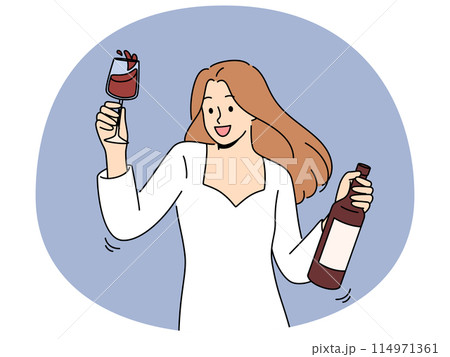 Woman dances at party holding bottle of wine and glass filled with exquisite alcoholic drink 114971361