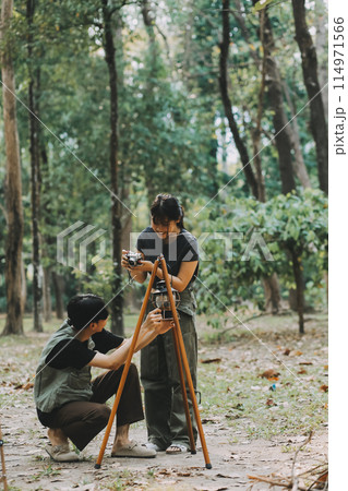 Asian couple sweet in tent inside on they camping trip, traveller relax and sleep togather in out door and camping trip 114971566