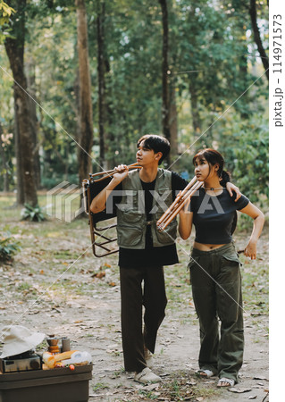 Asian couple sweet in tent inside on they camping trip, traveller relax and sleep togather in out door and camping trip 114971573