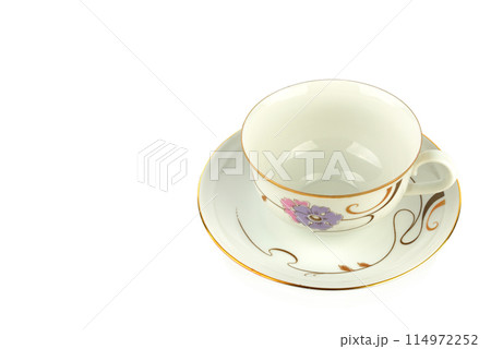 Vintage porcelain cup and saucer isolated on white. There is free space for text. 114972252