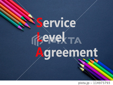 SLA service level agreement symbol. Concept words SLA service level agreement on black paper. Beautiful black background. Colored pencils. Business SLA service level agreement concept. Copy space. SLA service level agreement symbol. Concept words SLA service level agreement on black paper. Beautiful black background. Colored pencils. Business SLA service level agreement concept. Copy space. 114973793