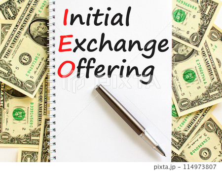 IEO initial exchange offering symbol. Concept words IEO initial exchange offering on beautiful note. Beautiful dollar bills background. Business IEO initial exchange offering concept. Copy space. IEO initial exchange offering symbol. Concept words IEO initial exchange offering on beautiful note. Beautiful dollar bills background. Business IEO initial exchange offering concept. Copy space. 114973807