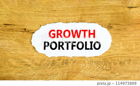 Growth portfolio symbol. Concept words Growth portfolio on beautiful white paper. Beautiful wooden wall background. Business Growth portfolio concept. Copy space. 114973809