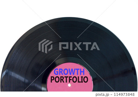 Growth portfolio symbol. Concept words Growth portfolio on beautiful purple black vinyl disk. Beautiful white paper background. Business Growth portfolio concept. Copy space. Growth portfolio symbol. Concept words Growth portfolio on beautiful purple black vinyl disk. Beautiful white paper background. Business Growth portfolio concept. Copy space. 114973848