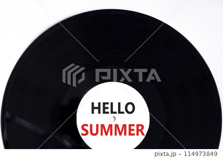 Hello summer symbol. Concept words Hello summer on beautiful white black vinyl disk. Beautiful white paper background. Business lifestyle Hello summer concept. Copy space. 114973849