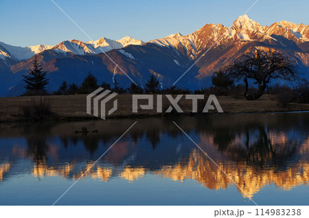 Golden Hour Reflections in the Mountains Golden Hour Reflections in the Mountains 114983238