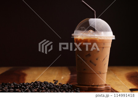 ice espresso on wood floor 114991418