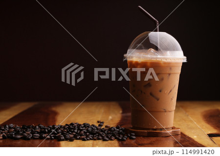 ice espresso on wood floor 114991420