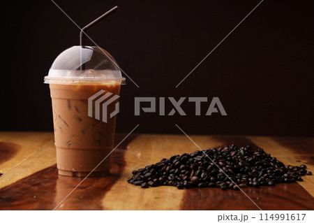 ice espresso on wood floor 114991617