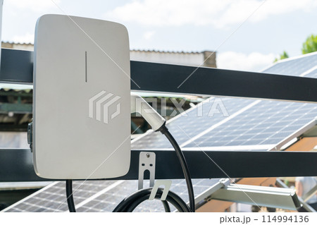 Electric vehicles charging station that takes energy from solar panels. Close up.. 114994136
