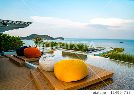 View of rooftop bar at sunset in Cape Panwa beach in Phuket, Thailand View of rooftop bar at sunset in Cape Panwa beach in Phuket, Thailand 114994758