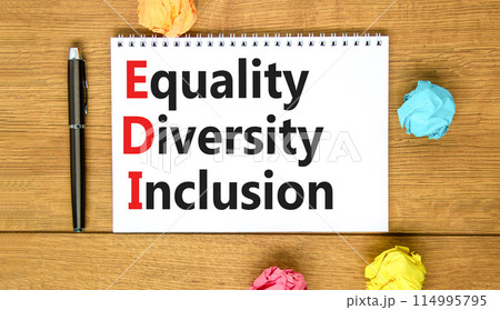 EDI equality diversity inclusion symbol. Concept words EDI equality diversity inclusion on white note. Beautiful wooden table background. Business EDI equality diversity inclusion concept. Copy space. EDI equality diversity inclusion symbol. Concept words EDI equality diversity inclusion on white note. Beautiful wooden table background. Business EDI equality diversity inclusion concept. Copy space. 114995795