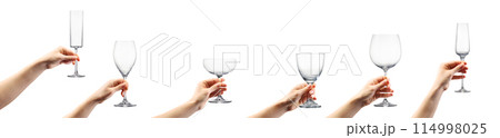 Woman hand holding empty cocktail glass isolated on white background Woman hand holding empty cocktail glass isolated on white background 114998025
