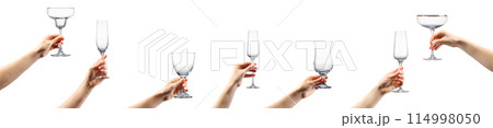 Set of hands holding empty cocktails, champagne and beer glasses on black 114998050