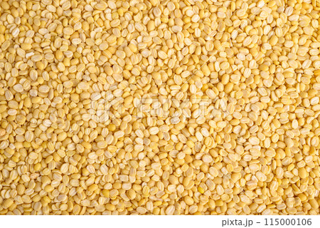 Yellow peeled split mung bean texture background, Food ingredient 115000106