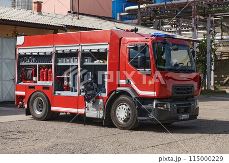 A state-of-the-art firetruck, equipped with advanced rescue technology, stands ready with its skilled firefighting team, prepared to intervene and respond rapidly to emergencies, ensuring the safety A state-of-the-art firetruck, equipped with advanced rescue technology, stands ready with its skilled firefighting team, prepared to intervene and respond rapidly to emergencies, ensuring the safety 115000229