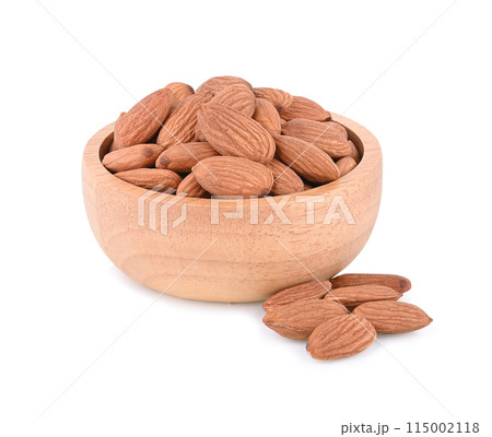 Almond in bowl isolated on white background Almond in bowl isolated on white background 115002118